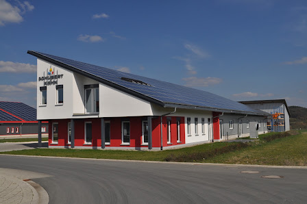 Schubert + Kühn GmbH & Co. KG Massivholzhäuser und Photovoltaikanlagen – Bild