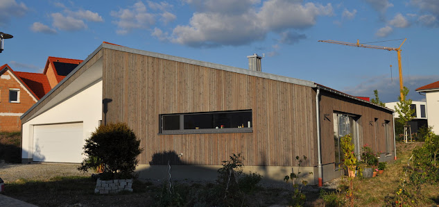 Schubert + Kühn GmbH & Co. KG Massivholzhäuser und Photovoltaikanlagen – Bild