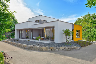Büdenbender Hausbau GmbH / Musterhaus Casaretto