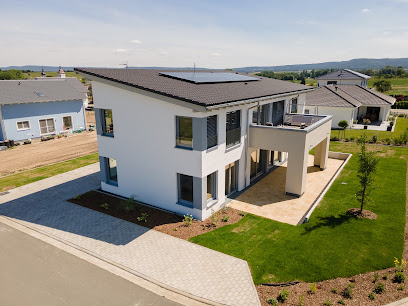 Büdenbender Hausbau GmbH / Musterhaus Chacco Duo